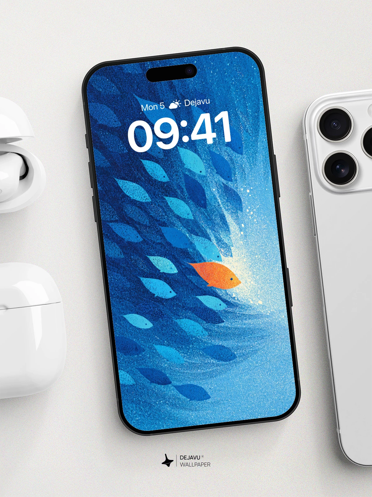 Oceanic Escape: Orange Fish Breaks the Blue Swarm Wallpaper 8K